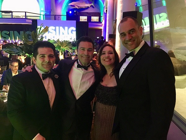Niko, Co-CEO and Founder (far left), and Dem, Co-CEO (second from right), and Juan Ruiz-Hau (far right) with Singer Mario at the Hispanic Federation 2018